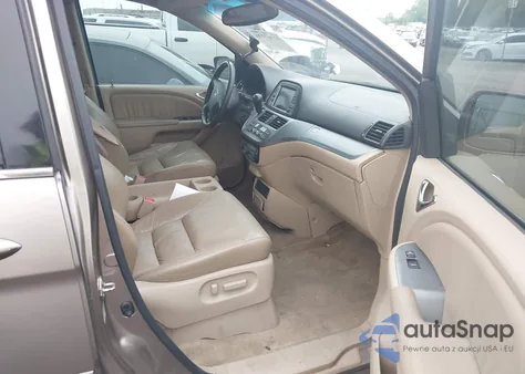 2010 Honda Odyssey Ex-L z USA, uszkodzony, nr VIN 5FNRL3H71AB047266